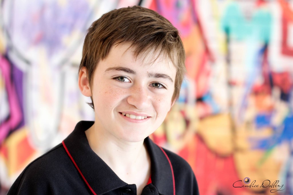 Photo taken of my son, using the Graffiti Wall on Pavement backdrop 
